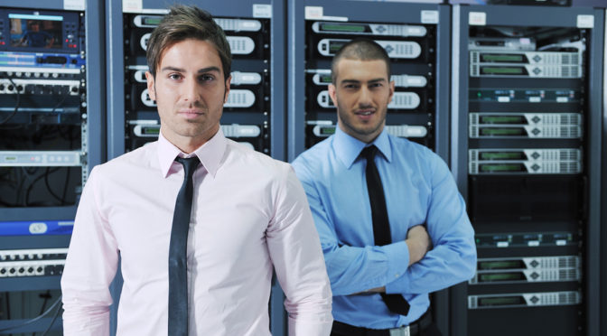 group of young business people it engineer in network server room solving problems and give help and support